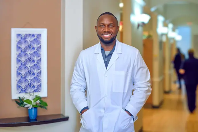 Dr. Kamdi Irondi, lead dentist at Kam Dental in Baytown, TX and Humble, TX